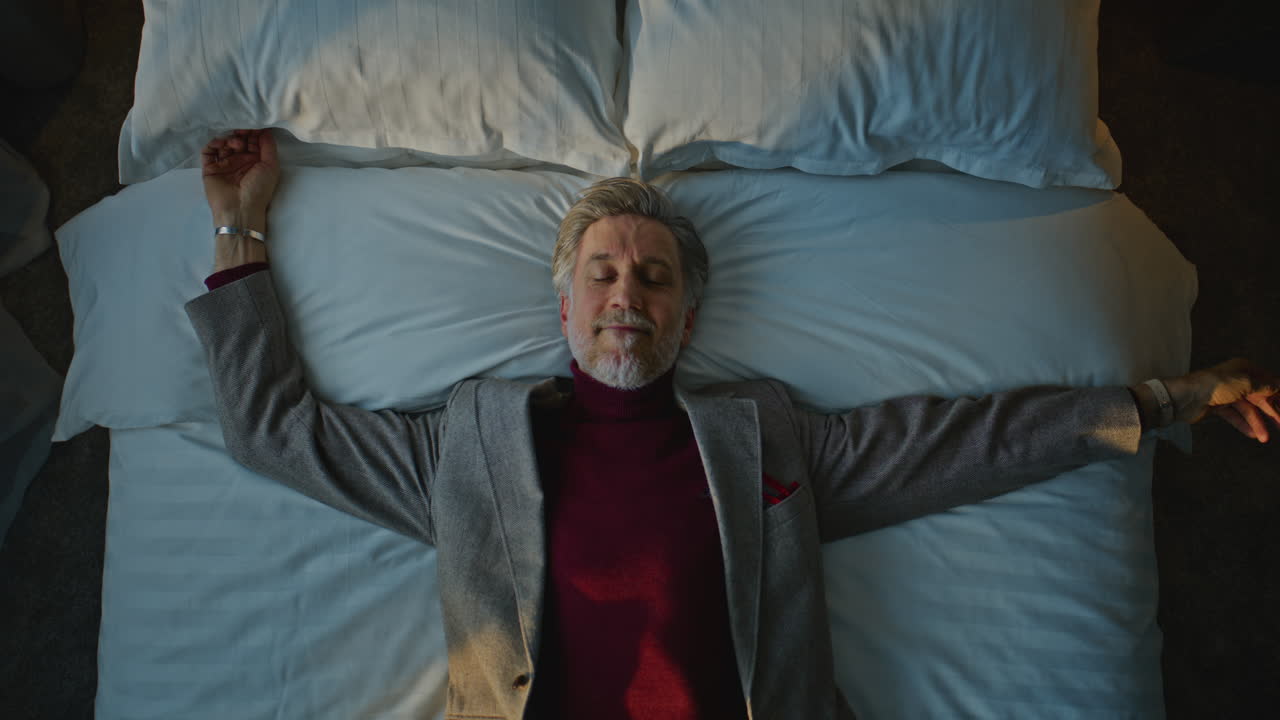 Man Sleeping Comfortably in Bed