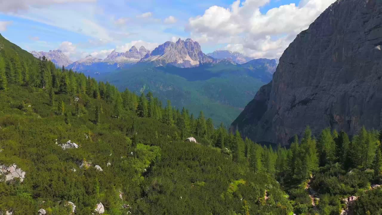 Lake Sorapis, nestled in the Dolomites of Italy, is renowned for its stunning turquoise waters, surrounded by majestic mountains and lush forests, offering breathtaking views and serene tranquility.