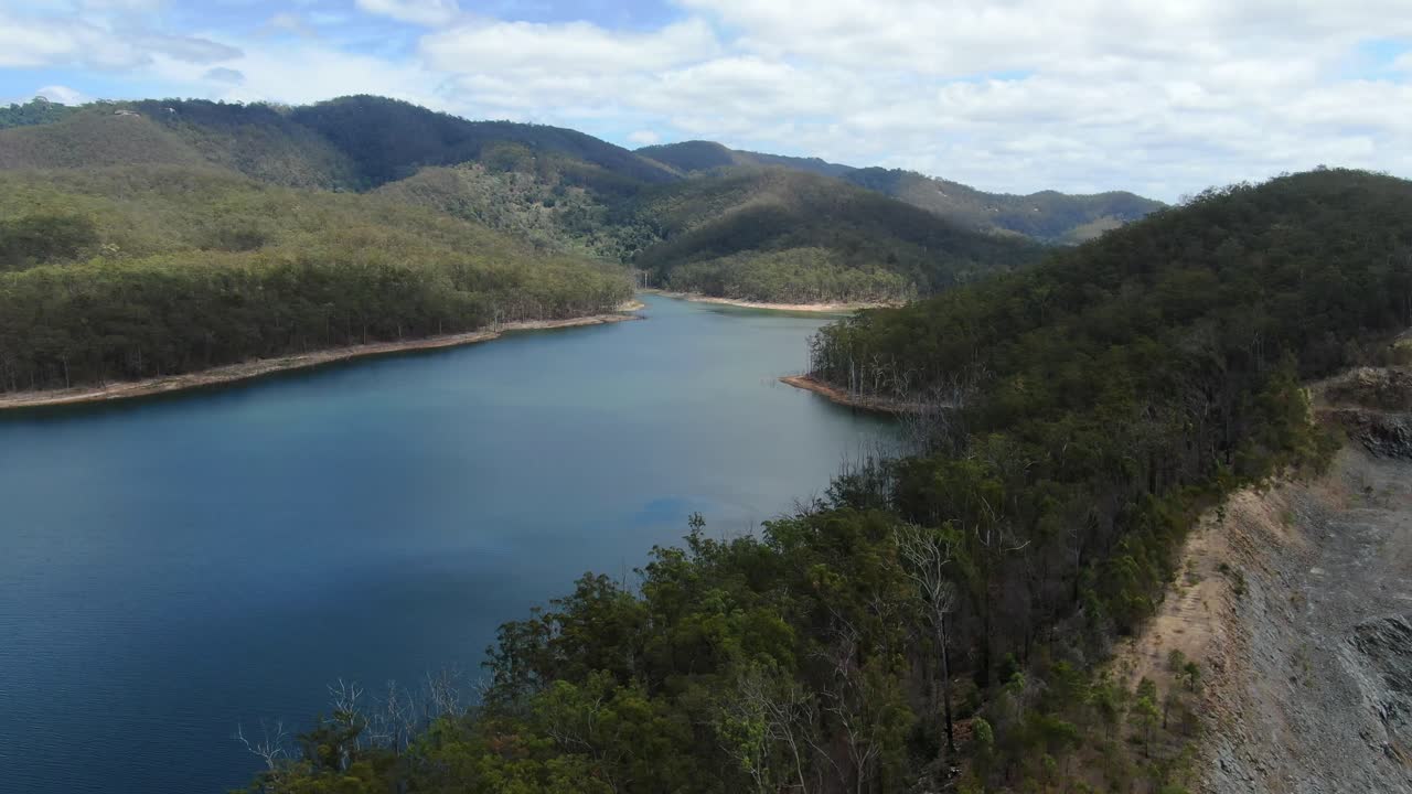 Advancetown Lake,summers day,calm water,small inlet, looking towards Gold Coast hinterland