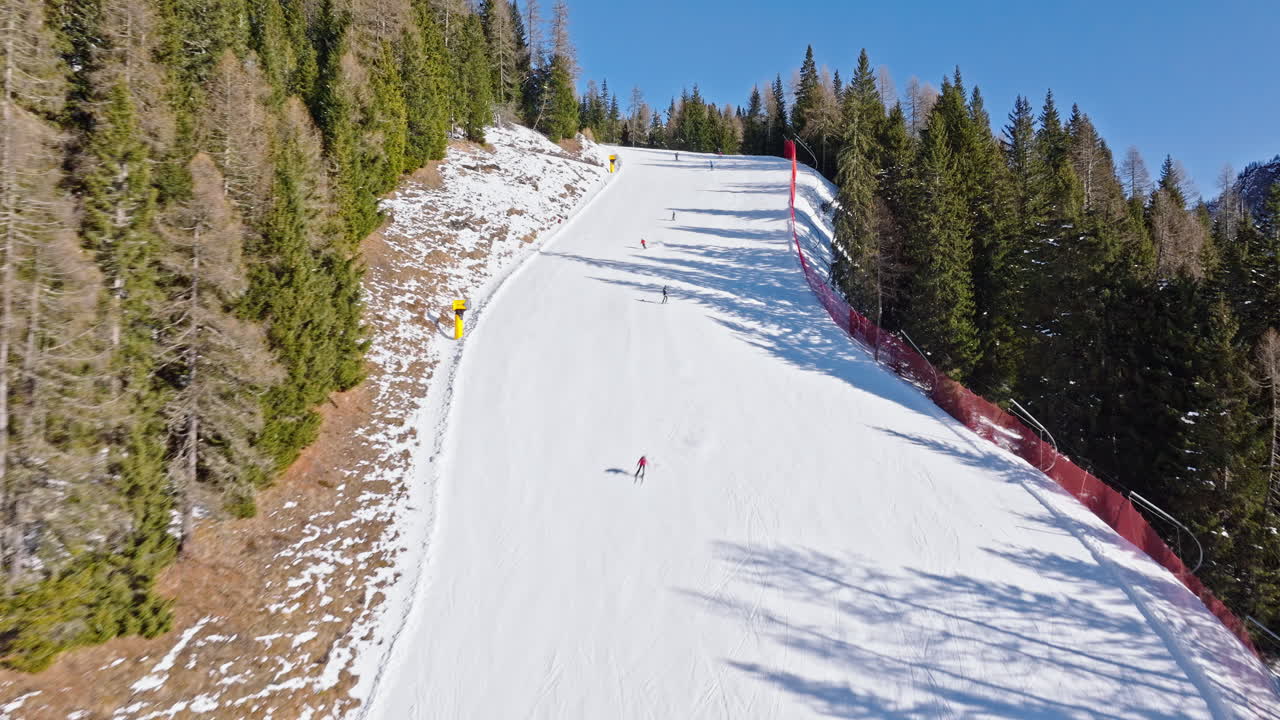 Aerial drone view of a ski resort in Piani di Pezze, Alleghe, Province of Belluno, in the Dolomites, Italy in daylight