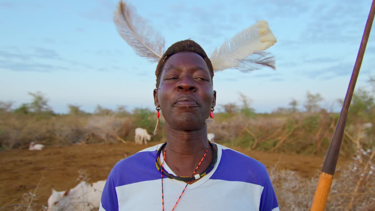 A Karamojong Man Calling Out Commands to His Children in Uganda, Africa - Close Up