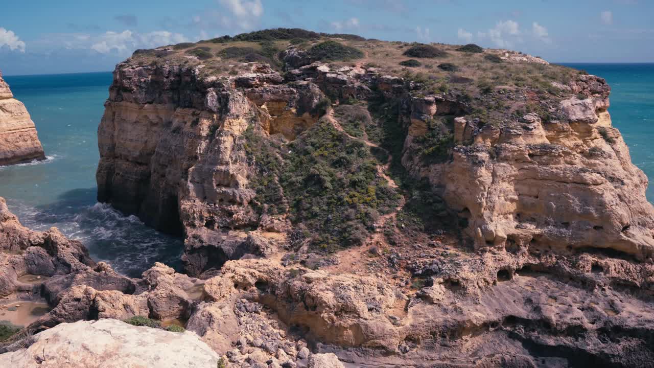 Coastal Cliff On The Seafront Of Ponta da Piedade Near Lagos, Portugal. Static Shot