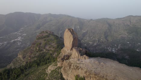 circular drone flight around roque nublo and the surrounding mountains of gran canaria.