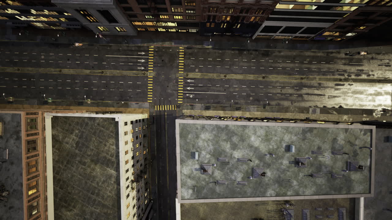 Aerial night view of a lit urban intersection