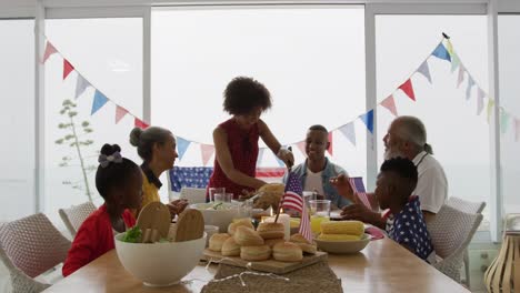 multi-generation family having celebration meal