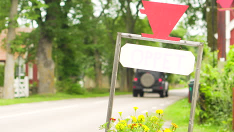 Close-up-of-track-white-chroma-key-sign-editable-text-entering-signs-city-limits-information-tourists-open-shop-close-road-speed-info-car-jeep-driving-summer-road-trip-vacation-family-happy-adventure