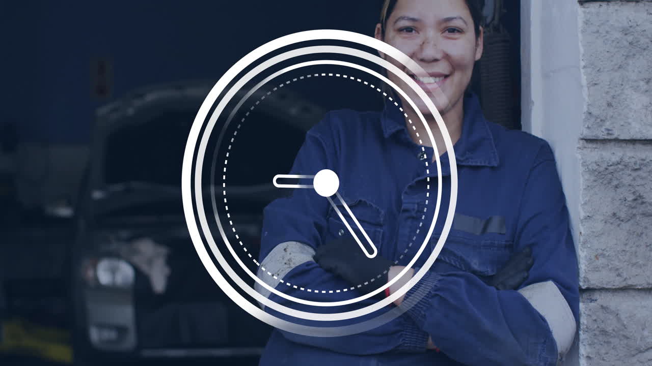 Mechanic in blue uniform smiling with clock animation overlay in workshop
