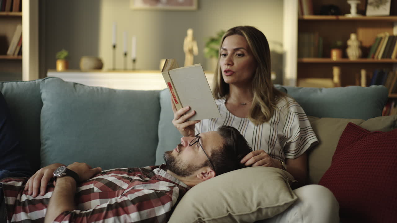 Couple Relaxing and Reading at Home
