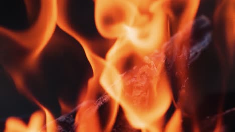 fire burns in the fireplace. evening mood. holiday concept. slow motion