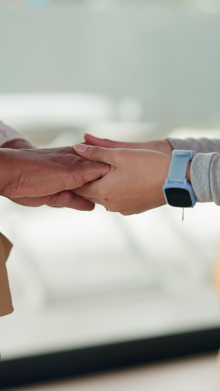 Close-Up of Two Human Hands Gently Holding for Comfort