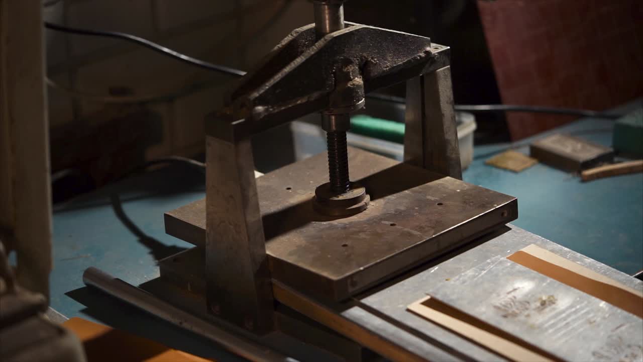 Leather Pressing Machine in Action