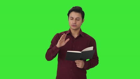 happy indian teacher solving student problems green screen