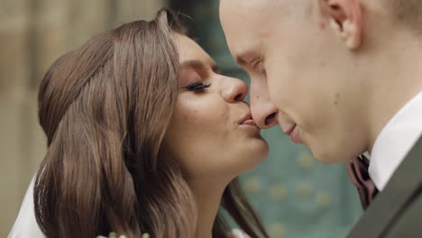 newlyweds, caucasian groom with bride walking, embracing, hugs in city, wedding couple in love