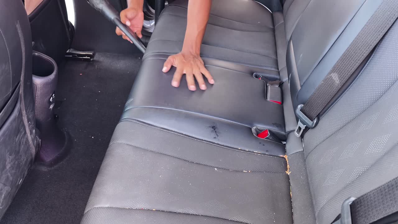 Cleaning a Car's Interior Seats with a Vacuum