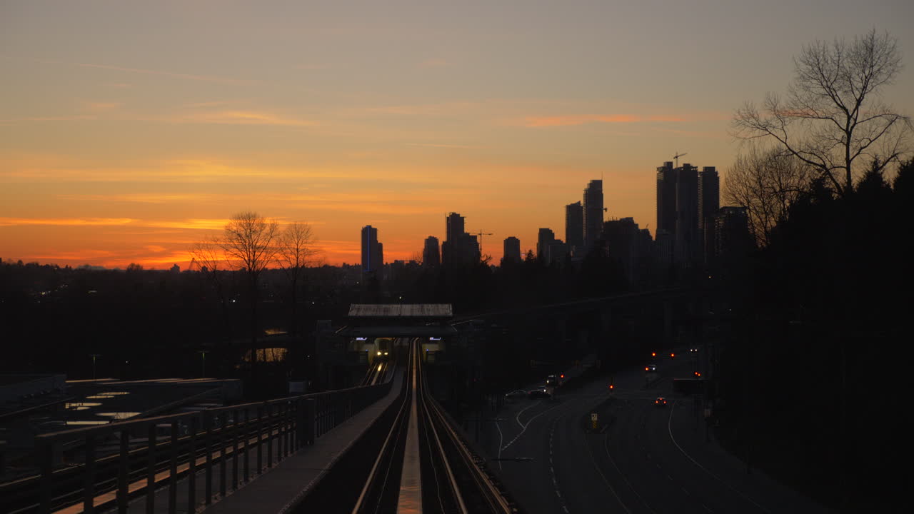 Riding the metro rail during sunset in the beautiful and peaceful city of Vancouver - wide rolling
