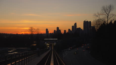 riding the metro rail during sunset in the beautiful and peaceful city of vancouver - wide rolling