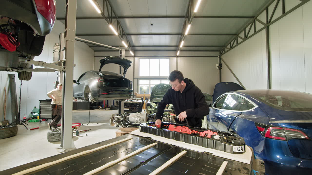 Tesla Car Repair in a Workshop