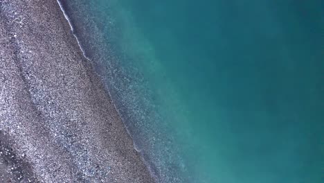 Calm-Waves-On-Black-Sea-Beach-Aerial-View