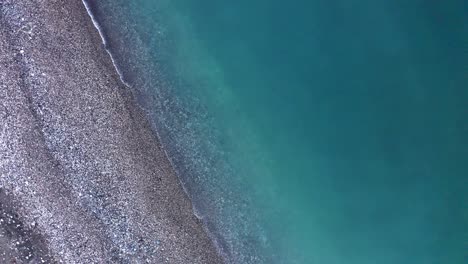 calm waves on black sea beach aerial view