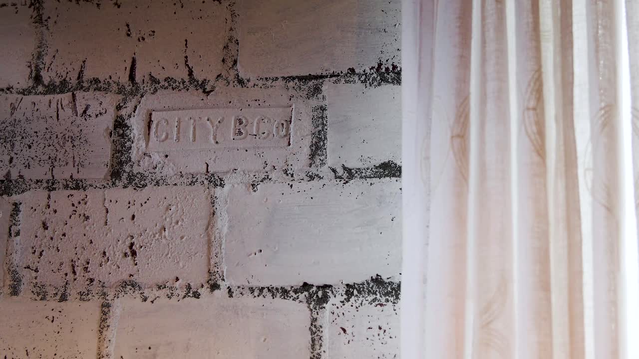 White Brick Wall with Sheer Curtain