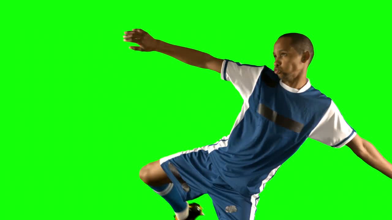 공을 차는 축구 선수