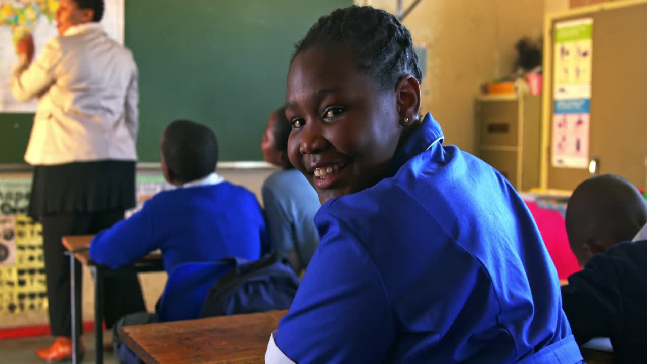 Schoolchildren in a lesson at a township school 4k