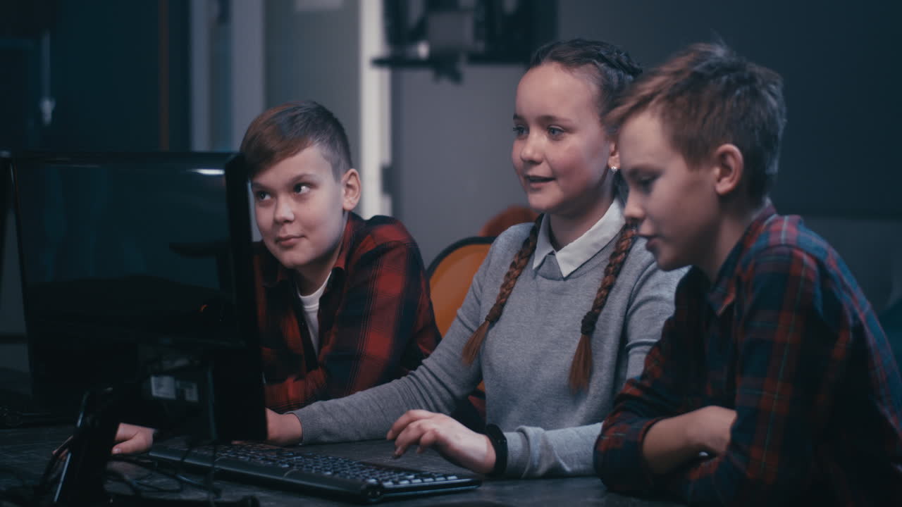 Children learning on computers