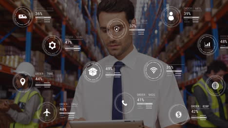 Animation-of-data-processing-against-caucasian-male-supervisor-using-digital-tablet-at-warehouse