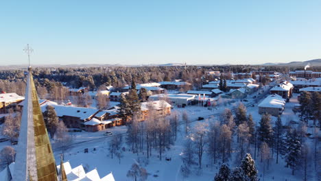 arvidsjaur in winter, revealing church with frozen tower, lapland