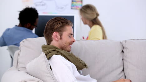 Attractive-man-working-on-laptop-