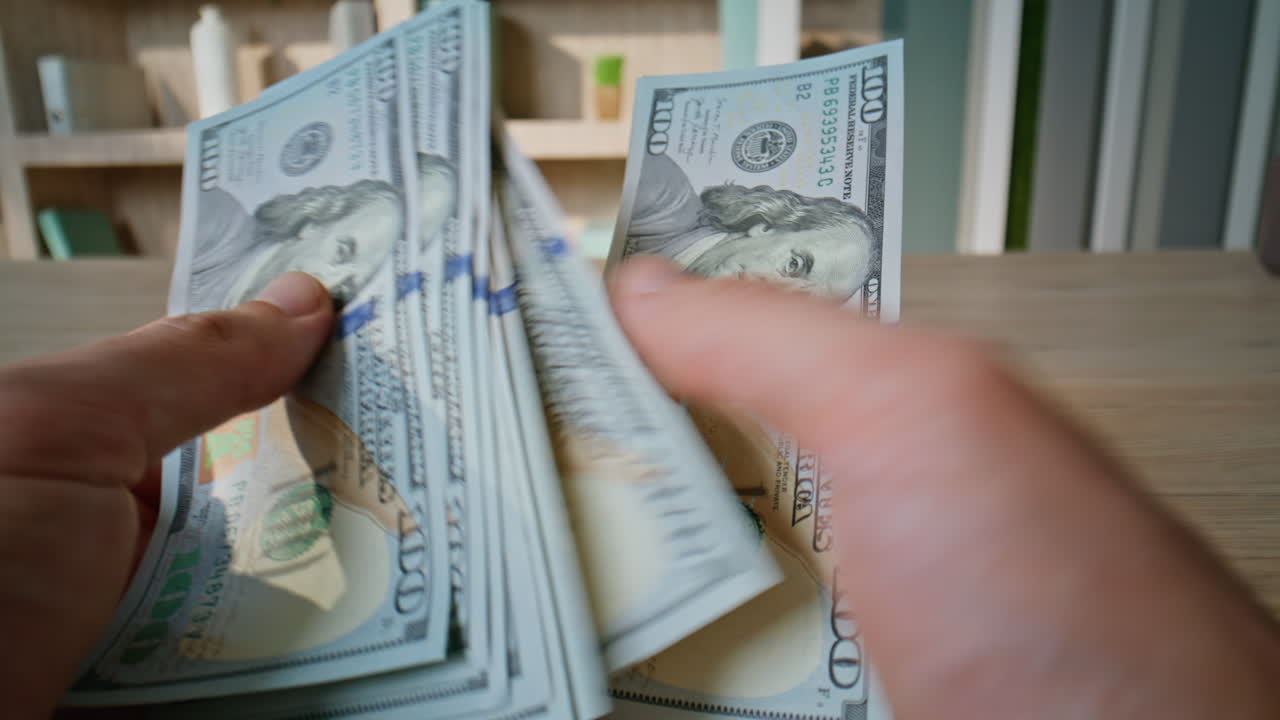 Investor hands calculating dollar bills at business deal closeup. Unknown man