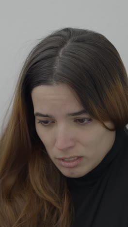 close-up portrait of a concerned woman