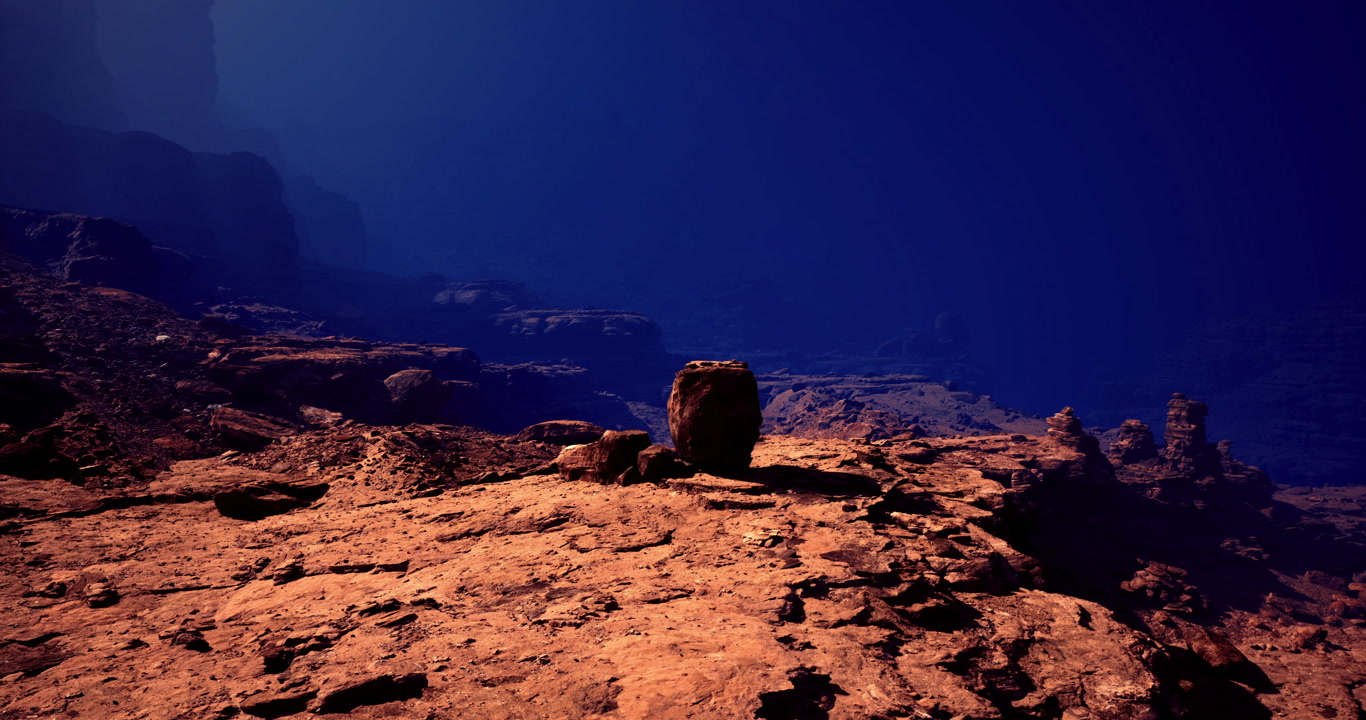 Exploring an underwater landscape with rocky formations and deep blue water