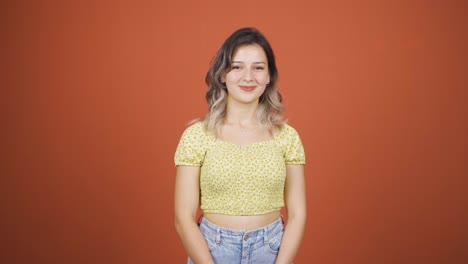 Young-woman-winking-at-camera.