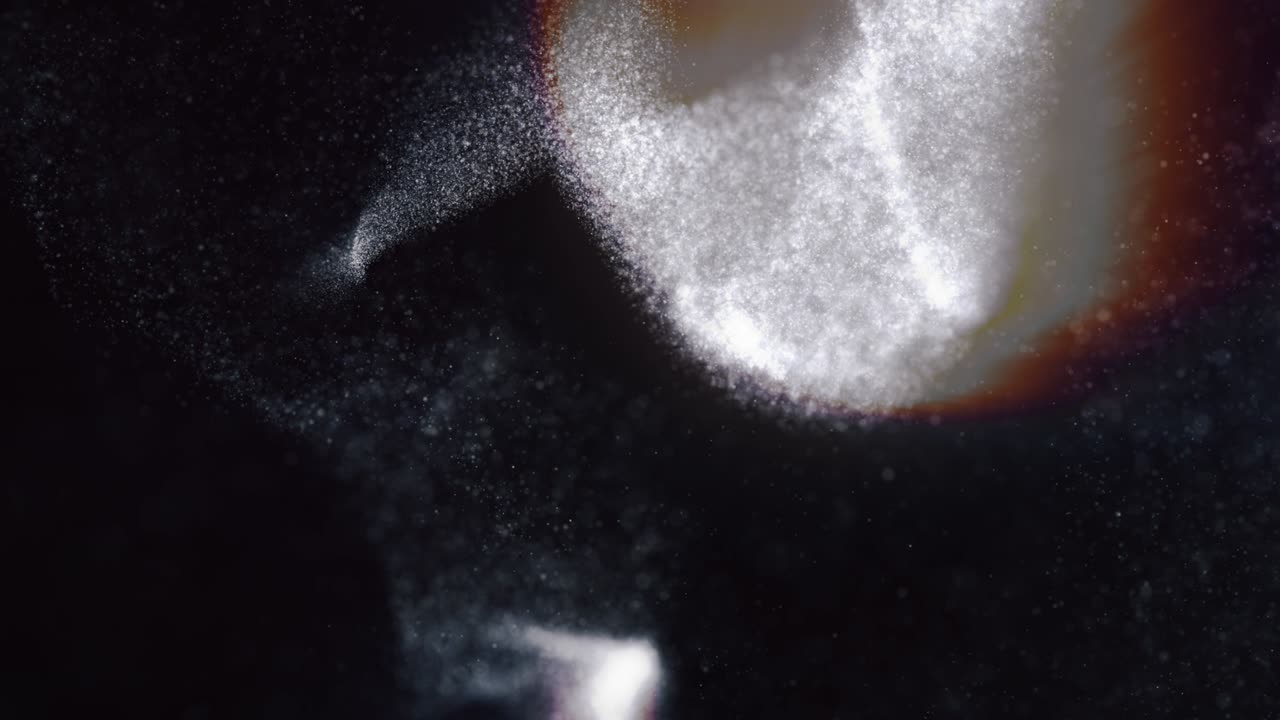 움직임 흐릿함으로 날아다니는 입자의 추상적인 애니메이션