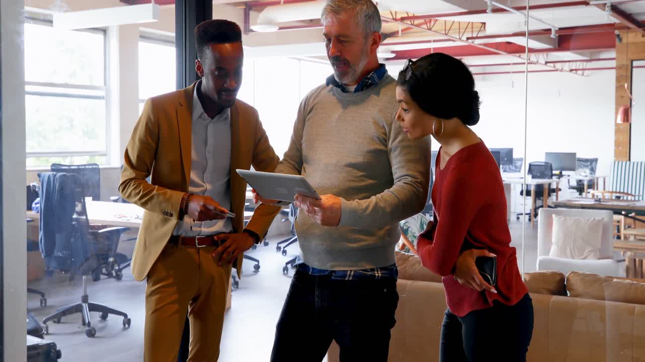 Executives discussing over digital tablet 4k