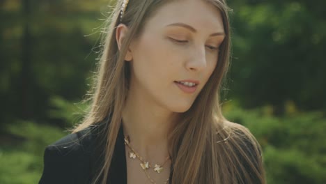 Blond-Lady-With-An-Elegant-Look-Gently-Stroke-Her-Hair-And-Take-A-Glance-In-Her-Wristwatch