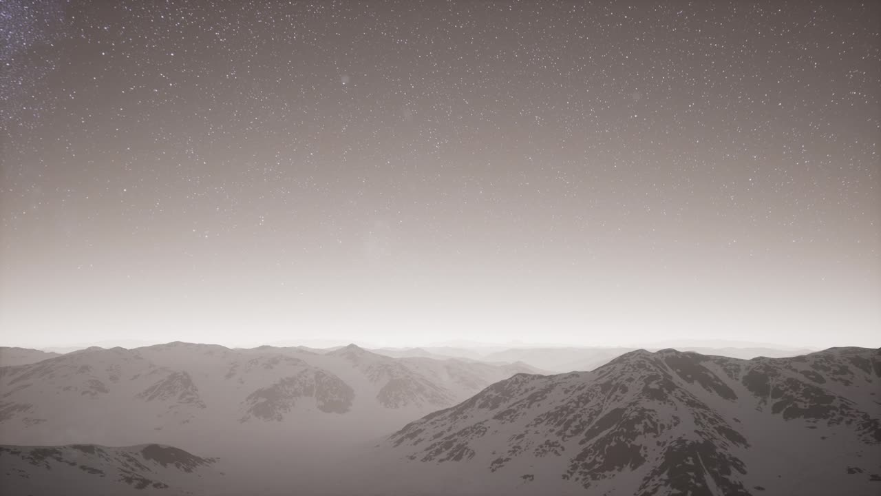 vía láctea por encima del terreno cubierto de nieve