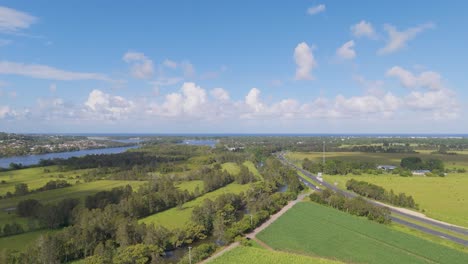 scenic view of fields, roads, and ocean