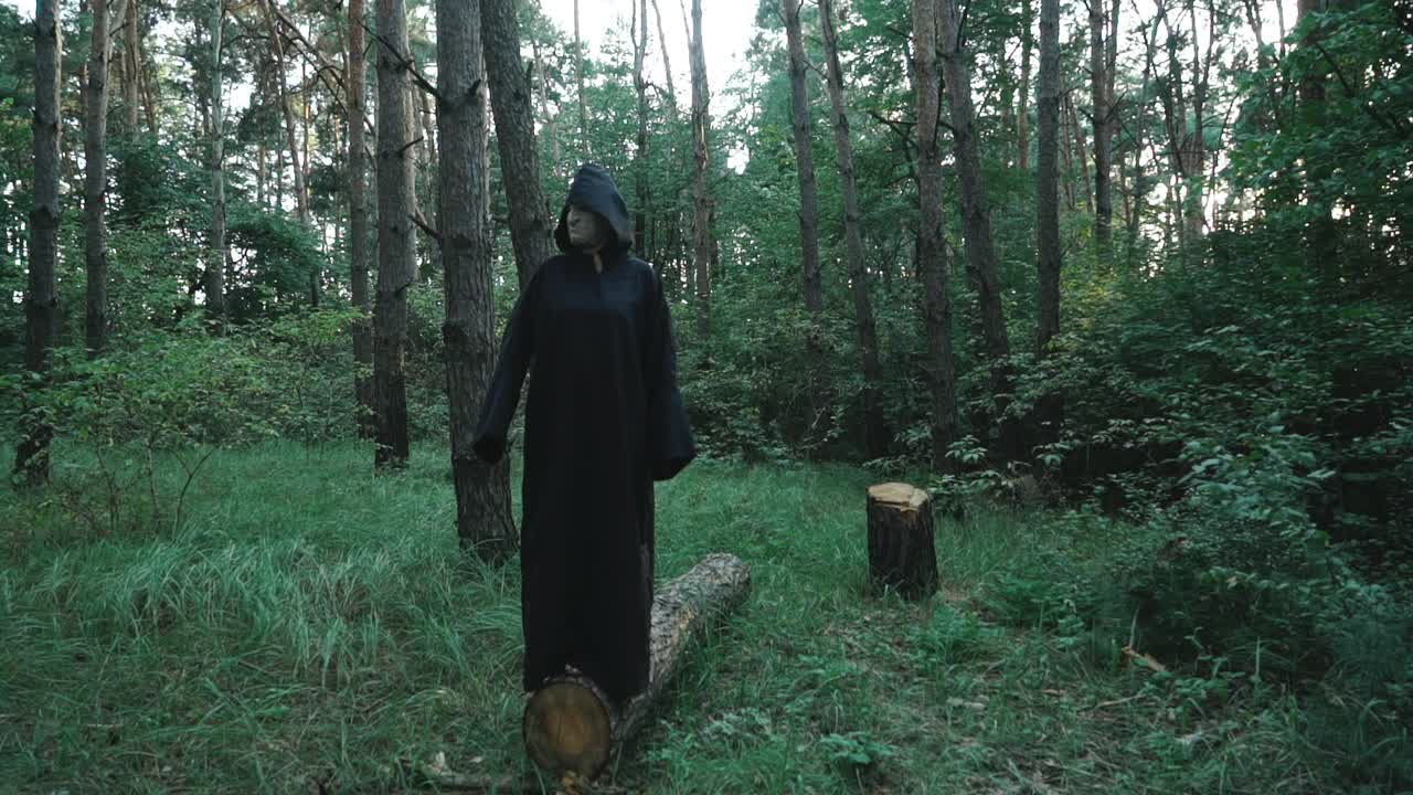 Terrible monster in dark spooky forest. Halloween costume