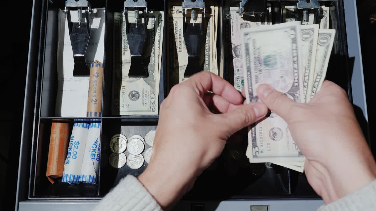 POV video: Cashier's work with the cashier and cash | Premium Stock ...
