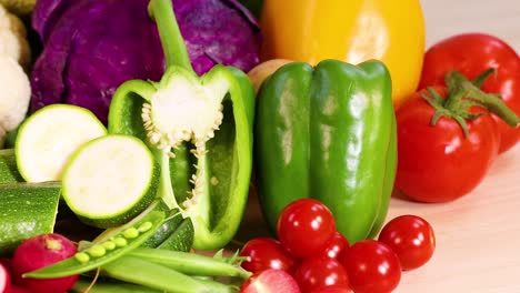 assorted vegetables arranged on a white background