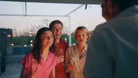 excited friends ordering alcohol at bar closeup. diverse people asking waiter