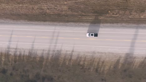following a truck from right to left from an aerial drone view