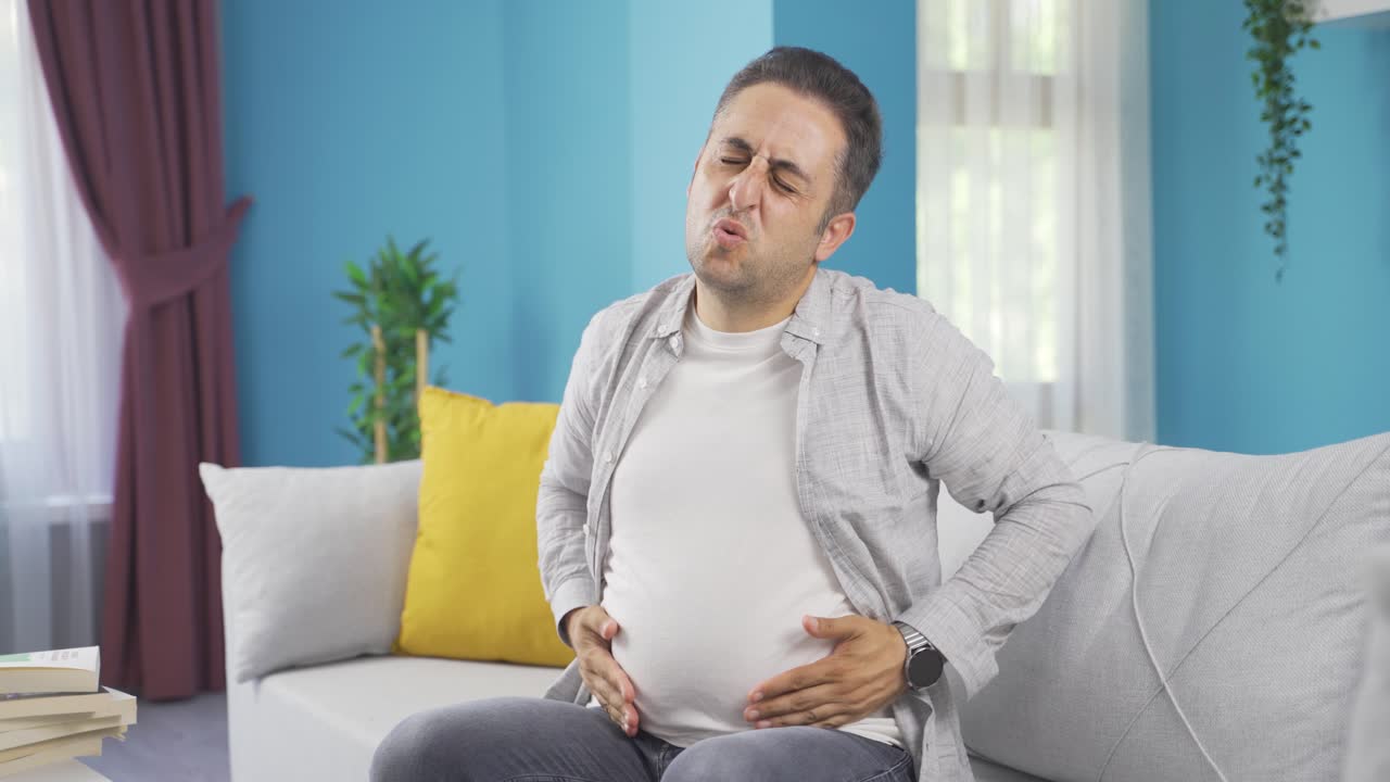 Man experiencing stomachache.