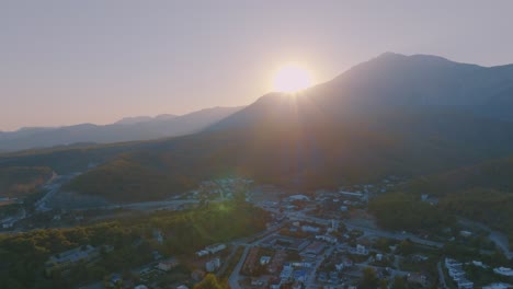 sunrise over mountain town