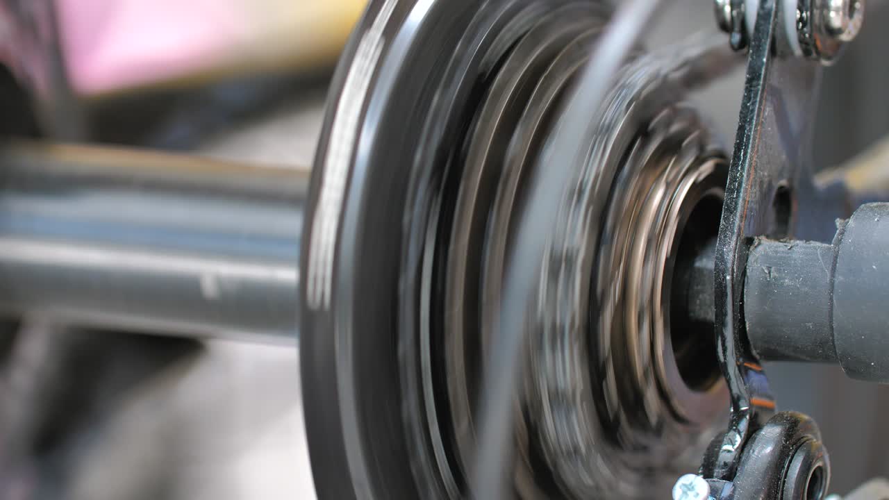 Close up shot rear spinning bicycle gear for healthy exercise and sport