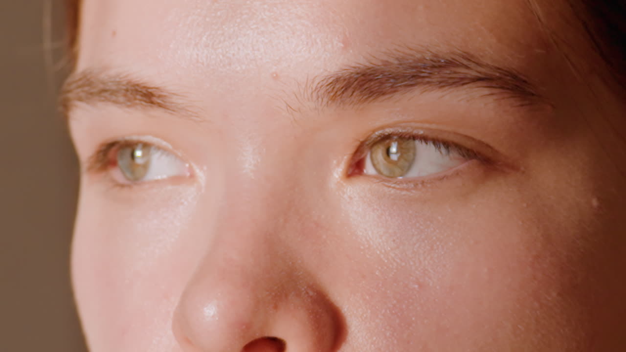 Caucasian Student Looks Out Window Thoughtfully, Closeup Of Green Eyed College Student Staring Outside, Detailed Shot Of Caucasian University Student Gazing Through Window Into Horizon