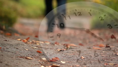 white clock and fallen leaves