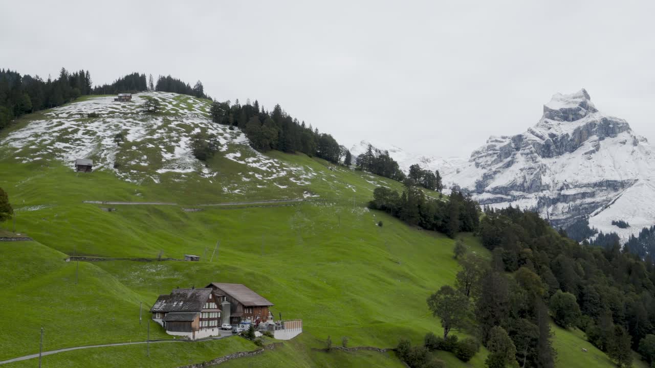 Majestic Swiss Alps: Snow-capped Peaks and Verdant Valleys